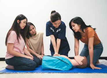 CPR Training ,Emergency and first aid class on cpr doll, Cardiopulmonary resuscitation